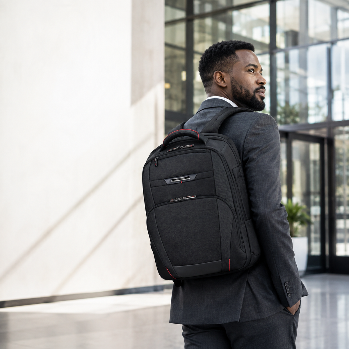 Professional carrying the Samsonite Pro-DLX 5 black backpack